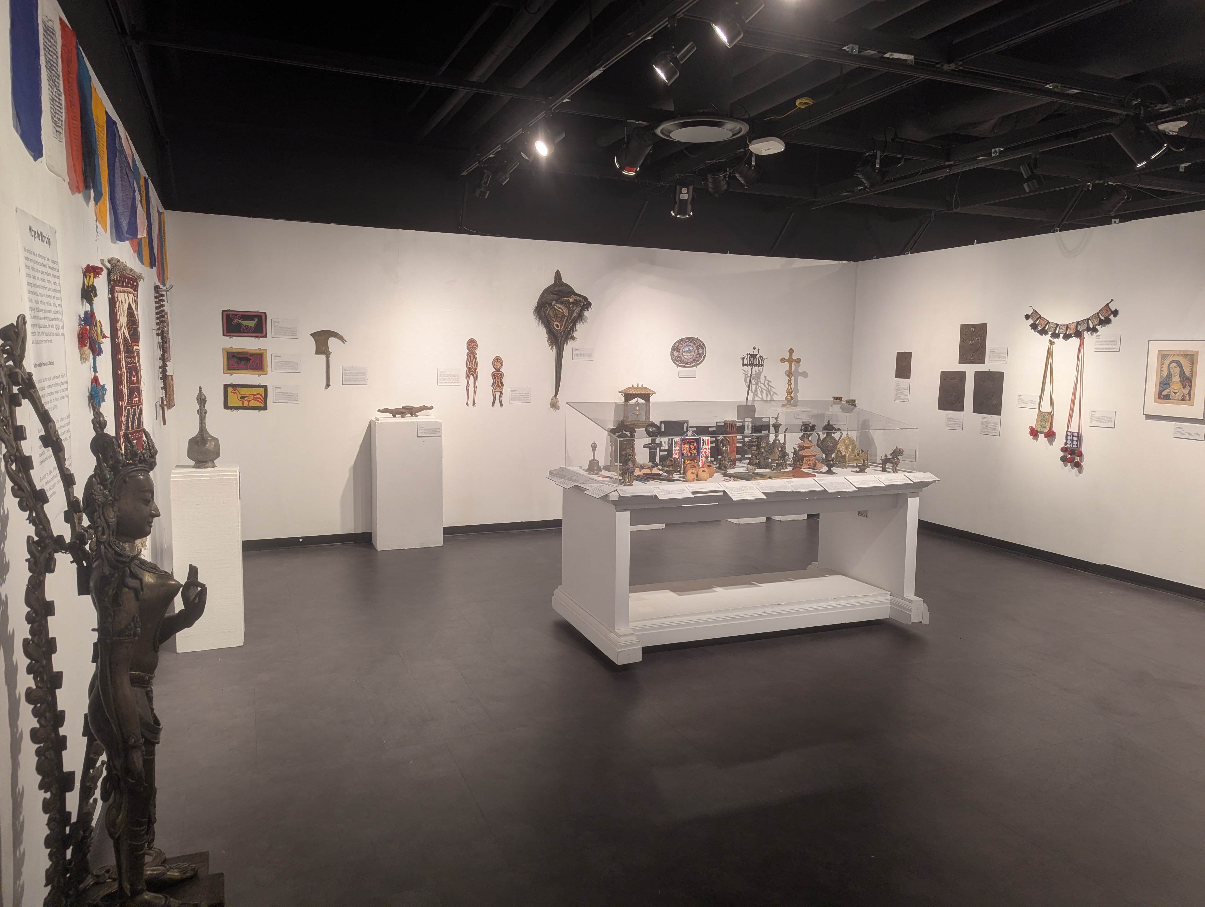 View of Ways to Worship exhibit artifacts in Dr. Cho-Yee To international Gallery