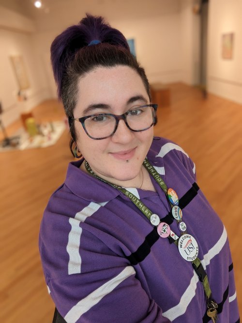 T Lance in a purple shirt